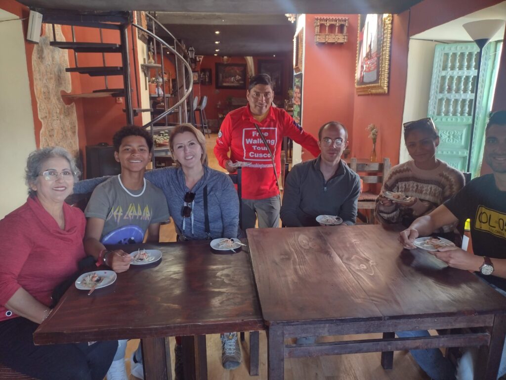 Free Walking Tour Cusco guide with a group of tourists after the tour