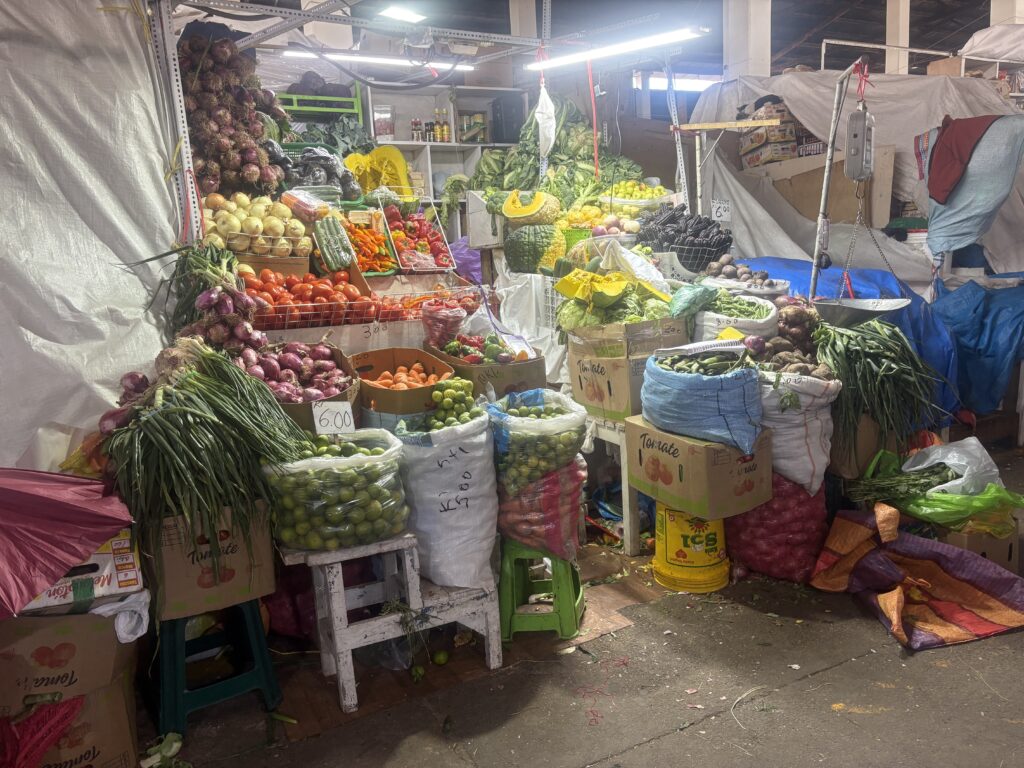 Traditional vegetables and fresh produce at San Pedro Market in Cusco.