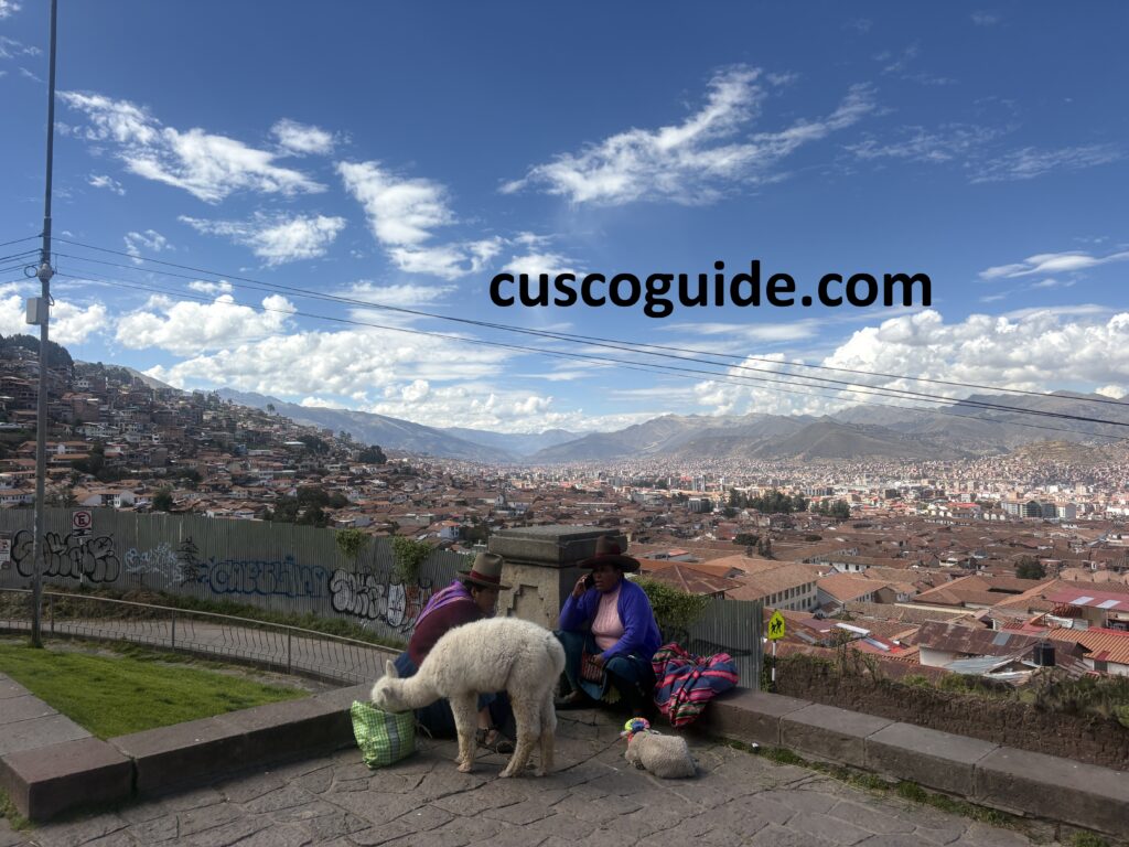 Panoramic view of Cusco valley from San Cristóbal Church with snow-capped Ausangate glacier visible in the distance